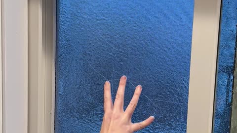 Ice Freezes Over Window Screen