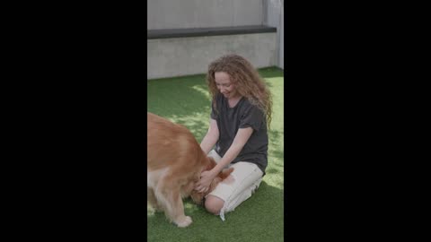 Woman Bonding with Pet Dog