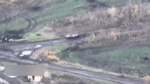 Ukrainian armored vehicle steps on a mine with infantry taking cover behind