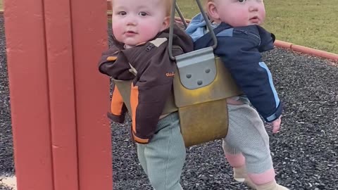 Twin Brothers Swing Together