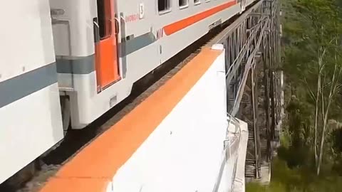 Train is passing over a very dangerous bridge😱😱