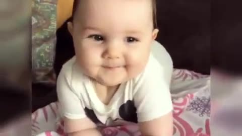This baby has such a cute smile!!