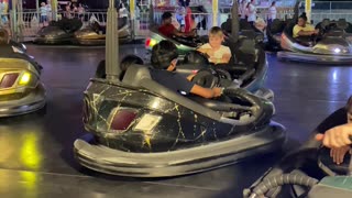 Kids Enjoying Bumper Car .................