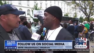 Ben Bergquam talks to a protester