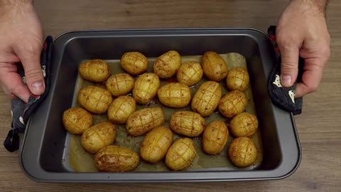 An easy and delicious baked potato recipe with garlic butter!