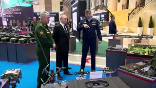 Putin shown new weaponry at defense ministry exhibition