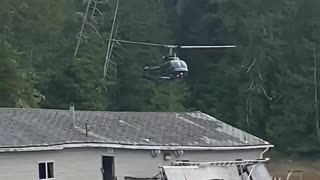 Helicopter Lands Behind Building!