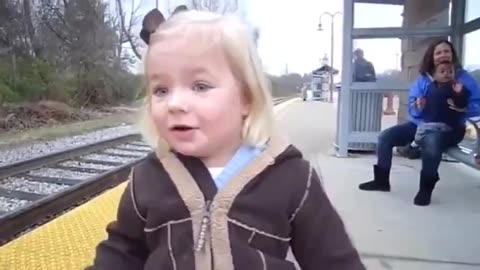 The joy of the little lady seeing a train for the first time!