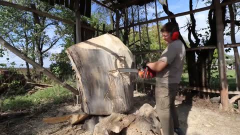 AMAZING CHAINSAW wood carving, Native American with wolves