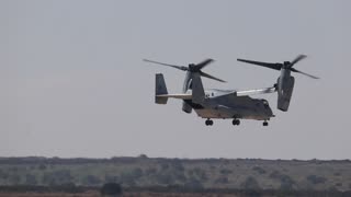V-22 Osprey doing a touch and go in helicopter mode