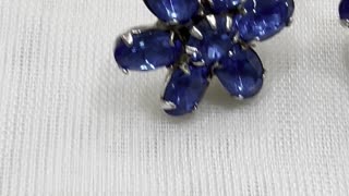 Rhodium Plated 1” Blue Flower Leverback Earrings. Made with Swarovski Crystal