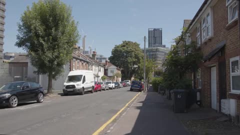 Residential Street In London England UK With Houses Tower Block