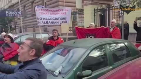 Albania: Kosovo supporters with US, EU flags protest outside Serbian embassy