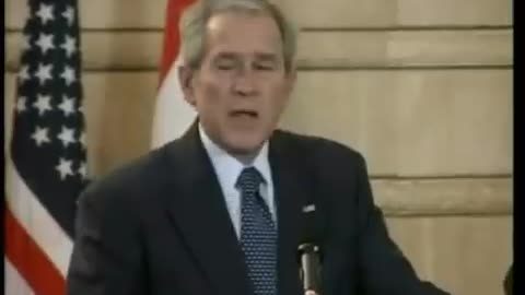 President Bush ducks at the podium as a shoe is thrown at him in Baghdad December 14, 2008