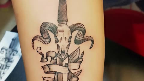 Sword tattoo