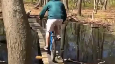 This stupid boy doing silly mistakes and fall in the lake