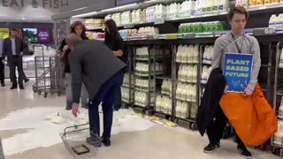 Scottish Environmentalists Dump Milk inside Supermarket in Protest of Dairy Industry