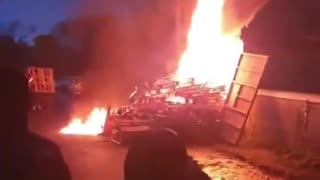 Locals have lit building on fire NewtownMountKennedy, Ireland which was set to
