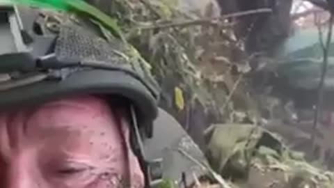 Ukrainian Soldier Under Intense Bombardment