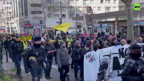 Riot police faced off with Yellow Vests in Paris on Saturday -