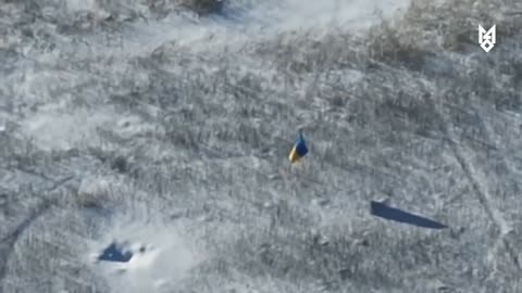 Ukrainians drop the flag in the field so everyone knows they're definitely not there....