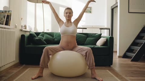 This Women Doing Exercise with Big Ballon