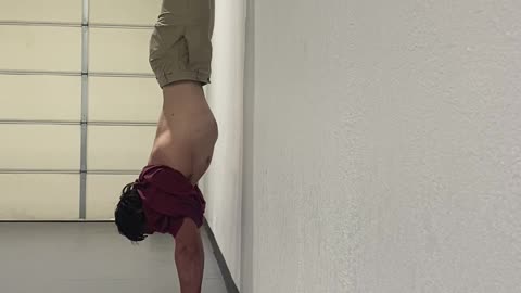 Pull into Handstand - Facing the wall.