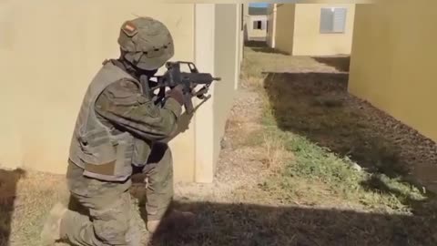 Catalonia" (motorized) Battalions training in combat in the town with the support of Leopardos