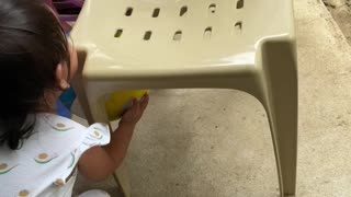 Toddler Struggles to Retrieve Ball