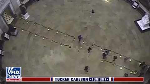 💥New footage just released by Tucker Carlson shows Capitol Police escorting Q Anon Shaman on J6