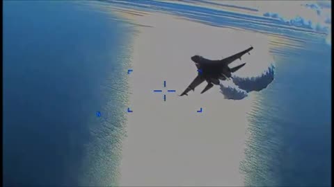 Su-27 fighter dropping fuel on MQ-9 Reaper
