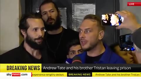 Andrew Tate and his brother Tristan being released from prison