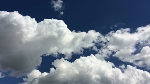 Watch the beauty of continuously slowly moving clouds