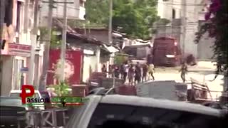 Haitians take cover as riots break out in capital