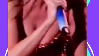 _Taylor Swift fan covers her face in an interview during a concert after lying at work.