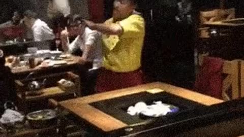 Waiter shows off cleaning skills