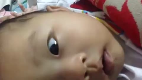Cute Baby wants to hug and kiss