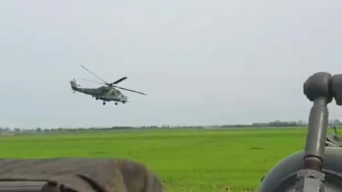 Ukraine War - Soldiers of an artillery brigade and a flight of a pair of Mi-24s