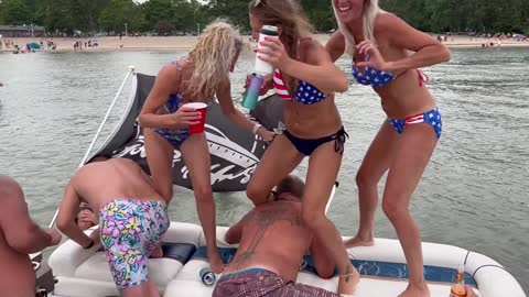 People Partying on the Back of Boat Fall into Water