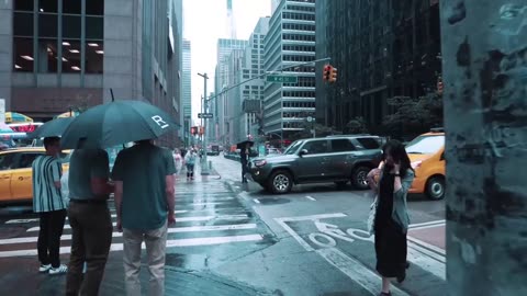 "Stormy Stroll: Times Square Rainwalk in Manhattan"