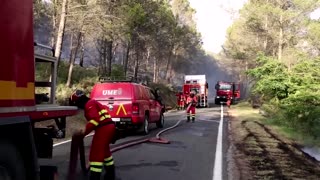 Emergency workers battle wildfires in Spain