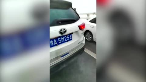 Fog causes major car crash on bridge in China