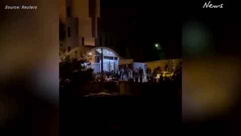 Video shows Tehran university protesters fleeing police