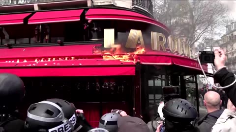 Paris protesters torch one of Macron's favorite eateries