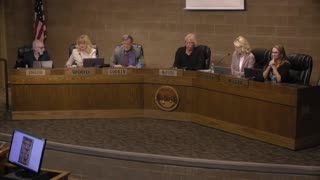 Unhinged Bureaucrat Tries To Burn Books At Local City Council Meeting