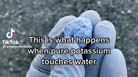 Potassium hits water big explosion