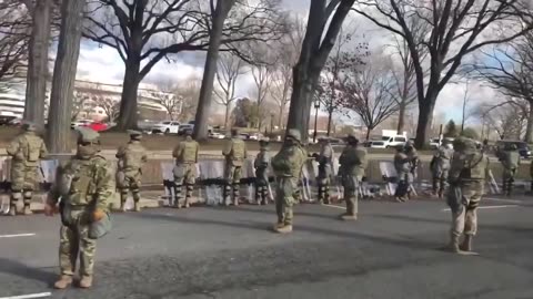 Military troops turn their backs to Biden's Inauguration Day motorcade January 20, 2021