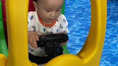 Baby son playground playing educational games