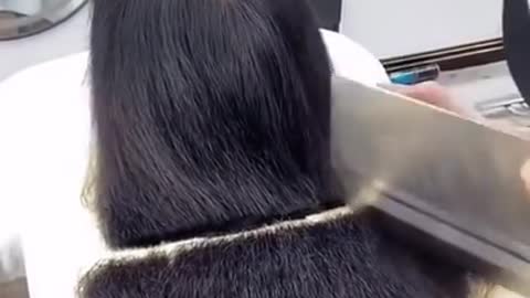 cutting hair in the butcher shop