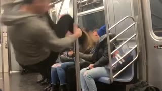 Woman in grey sweater spinning on pole